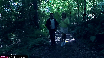 The busty blonde gets naughty in the forest