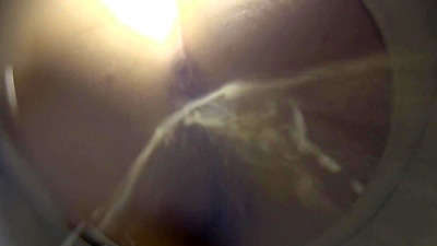 Anal milk enema with piss in public toilet