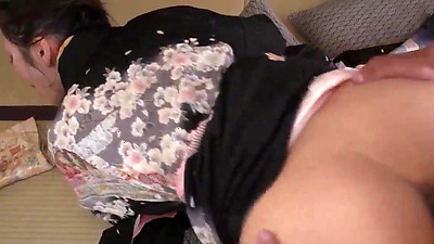 Horny Japanese mummy creams inwards her kimono while being fellated by a skilled Asian deep-throater in the greatest JAV ever!