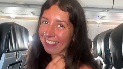 Risky public blowjob on a plane - we got caught!