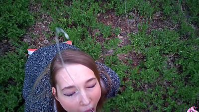 Powerful cumshot all over the face of a sexy nymphomaniac in the forest (part 2)