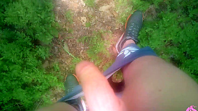 Powerful cumshot all over the face of a sexy nymphomaniac in the forest (part 2)