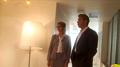 Virtual women engage in oral sex and engage in sexual intercourse with a phallic sex toy on a white leather couch