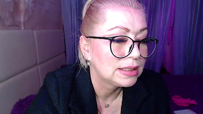 A cool busty vulgar mature bitch in glasses with a ponytail on her head...