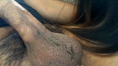 Asian hottie sucks big penis and balls