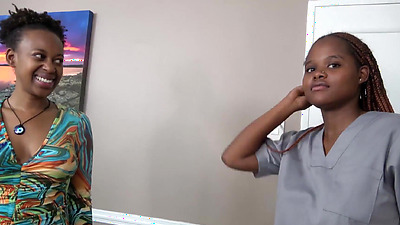 Two hot ebony masseuses cannot resist a thick meaty shaft during massage