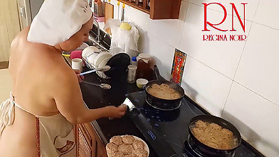 Nudist housewife Regina Noir cooks at the kitchen. Naked maid. Naked housewife. s3