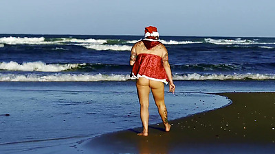 Horny Santa Claus on the beach gave her pussy as a gift to an Instagram follower. Watch the full video on Cassiflix