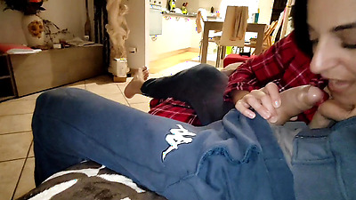 Wife in pajamas fucks a friend in silence while her husband is in the room