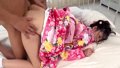 Japanese woman with big tits in a kimono,Ako Nishino, gets hard cocks and enjoys it uncensored.