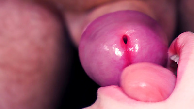 Ultra close up cum in her mouth! She lazy teases cock with lips and tongue, all face covered in cum