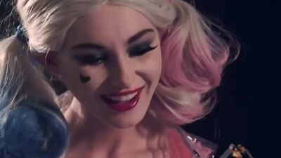 Harley Quinn has a sensual way to get back at her ex by seducing his partner in crime with her hot and horny body