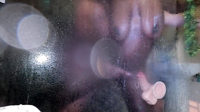 Hot Ebony Milf tries her new toy in shower and gets caught