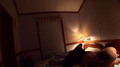 Brunette Asian chick is fed loads of cum by a chubby guy in a 3some