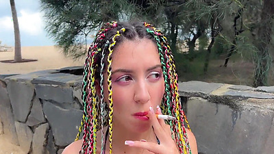 Rastafarian chick smokes a magic cigarette and wants anal sex