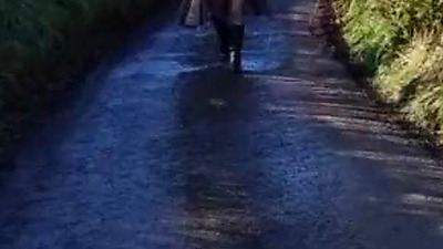 Near naked, chilly day public walk