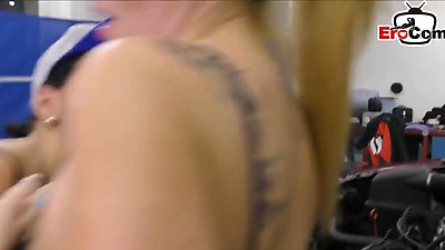 Threeway In Workshop With 2 Car Mechanics