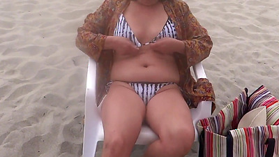 On the beach, my stepson wants to fuck me and cums in my pussy with his big dick.