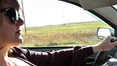 Sexy blonde MILF drives car without panties in stockings on high heels. Slutty wife asked direction of traffic from random passerby. Public. Naked in public. Big natural tits Milf. Boobs. Hairy pussy