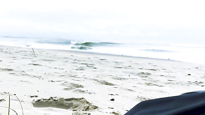 Filming an anal scene on the beach in front of passersby