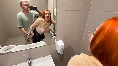 Redhead ready to fuck in public toilet