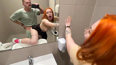 Redhead ready to fuck in public toilet