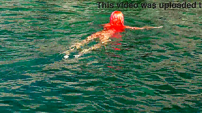 Blue water and a naked babe!