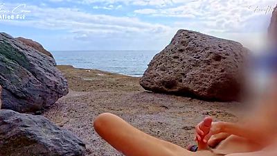 BEACH HANDJOB: during my exhib trip I find the two girls flashed in the parking lot