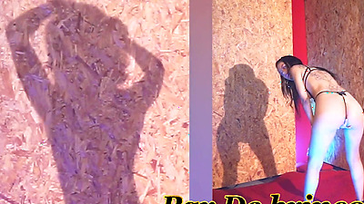 Two naughty girls facing a giant toy