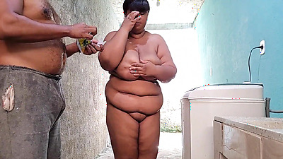 Stepmother takes a lot of cum on her stepson's face in the backyard