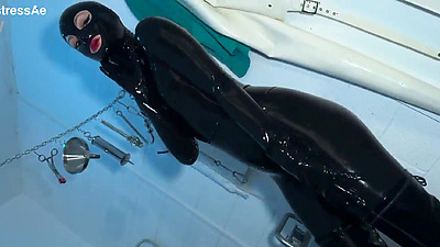 Solo 1: Showcasing Studio, Black Latex Catsuit, and Huge Red Cobra Strap-on