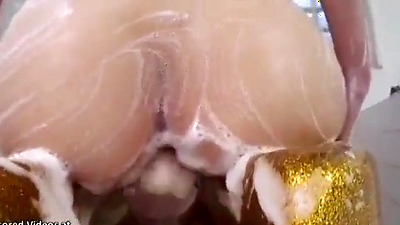 Busty Japanese enjoys intense oiled sex