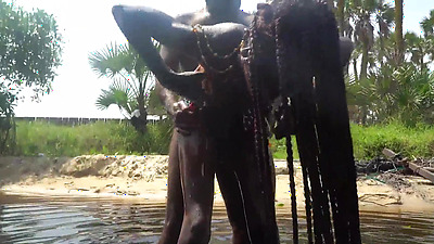 Skinny zulu cutie with perfect tits getting fucked while bathing in the river
