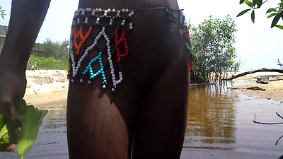 Skinny zulu cutie with perfect tits getting fucked while bathing in the river