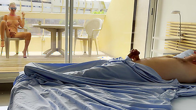 Naked wife was already watching nudists on street when husband woke in the morning