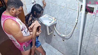 Giving her butt in the bathroom while her friend is next to her waiting for everything to end