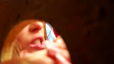 Chick gives head at gloryhole