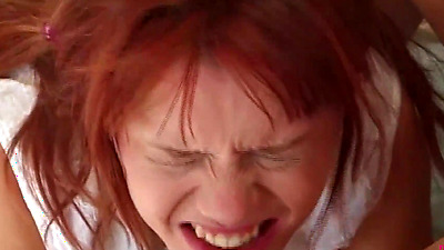 An experienced woman wants to instruct her red-haired stepdaughter in the art of performing fellatio on a man.