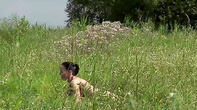 Hot summer day. A couple is swimming in a nearby lake. The milf brunettes sexy body is twisting and turning while she is getting hammered from behind. She loves having anal sex by this small lake.