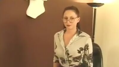 Sexy brunette hair stands over the camera and shows her taut bawdy cleft