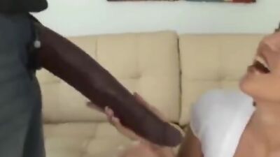 Brunette Tries To Suck Huge Cock