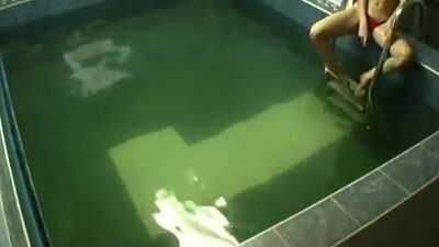 Swelling clit stroked in the pool!