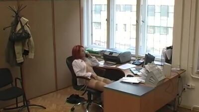 Redhead masturbating at the table!