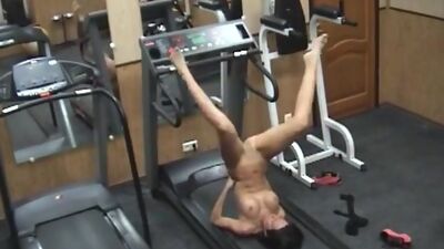 Lustful brunette playing wild in the gym!