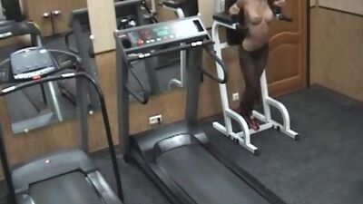 Lustful brunette playing wild in the gym!