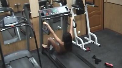 Lustful brunette playing wild in the gym!