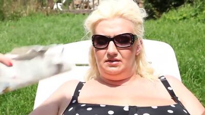 Chunky bbw teasing her sub outdoors with tits