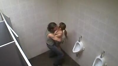 Horny babe fucked in the men's room!