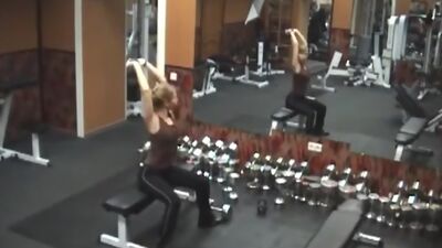 Stripping gal caught by security cam in the gym!