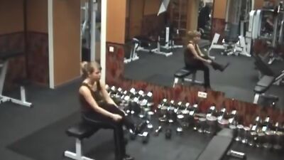 Stripping gal caught by security cam in the gym!